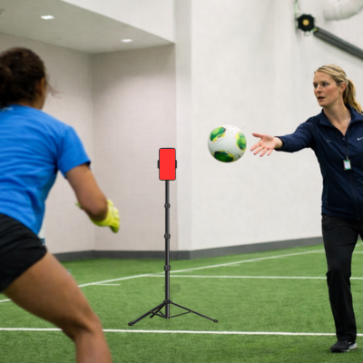 Football Goalie training on a field