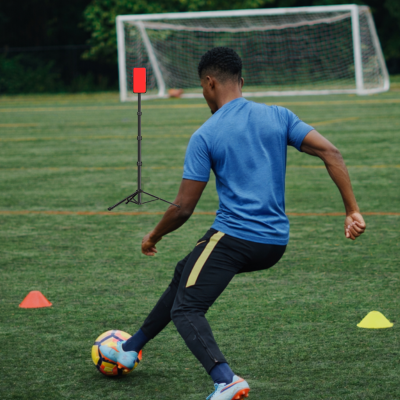 Football Player Scanning and training on a field